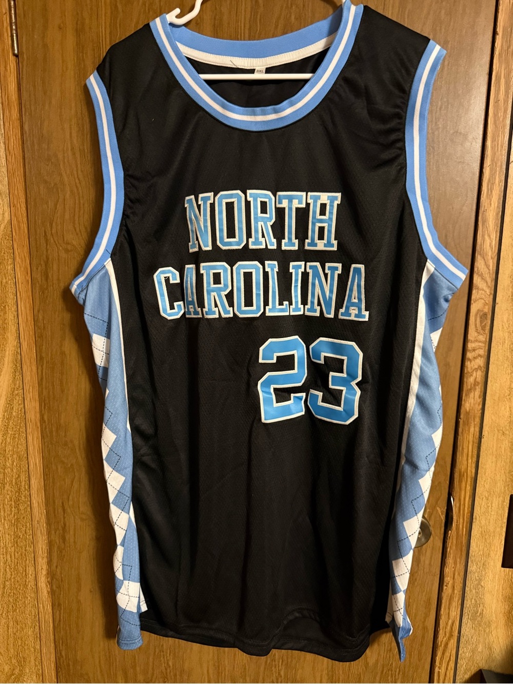 Jordan North Carolina 23 Black and Light Blue Basketball Jersey
